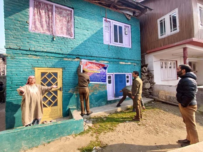 Authorities on Monday seized a two storeyed residential house in Khudwani area of Kulgam district in Kashmir. -Excelsior/Sajad Dar Authorities on Monday seized a two storeyed residential house in Khudwani area of Kulgam district in Kashmir. -Excelsior/Sajad Dar