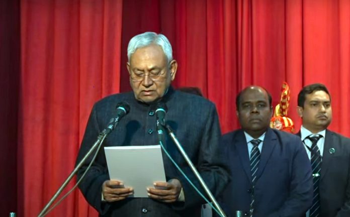 JD(U) leader Nitish Kumar takes oath as Bihar CM at Raj Bhavan in Patna on Sunday.(UNI)