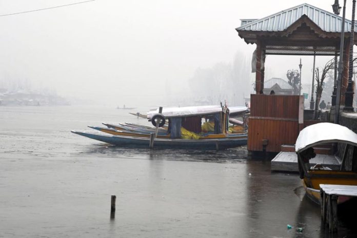 A thin layer of ice formed over Dal lake in Srinagar amid extreme cold conditions. (UNI) A thin layer of ice formed over Dal lake in Srinagar amid extreme cold conditions. (UNI)