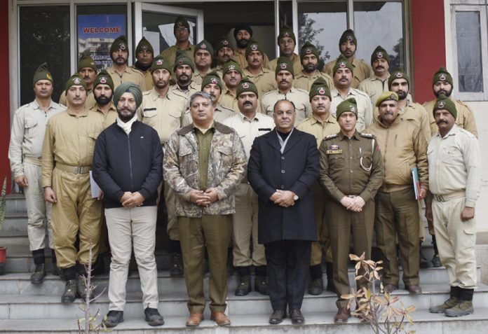Participant of training courses posing with faculty at PTTI Vijaypur.