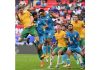 India and Australia players in action during a football match.