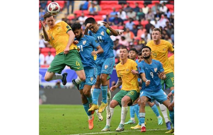 India and Australia players in action during a football match.