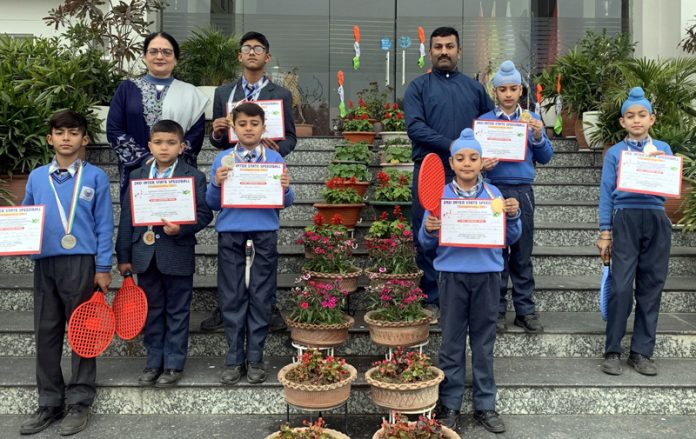 Speedball players posing with certificates and medals.
