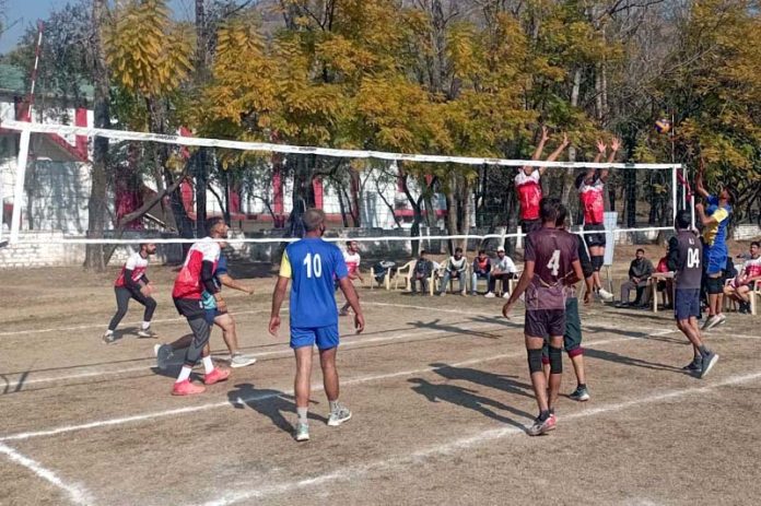 Volleyball players in action during a match in Poonch.