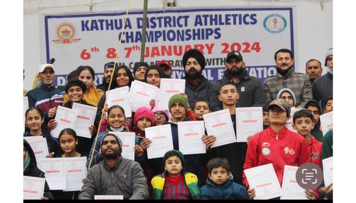 Athletes displaying certificates while posing for group photograph at Kathua. Athletes displaying certificates while posing for group photograph at Kathua.
