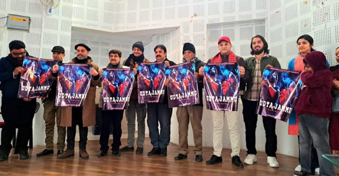 Jayesh Gupta, Producer and Director of ‘Udta Jammu’ launching the poster of film in Jammu on Friday.