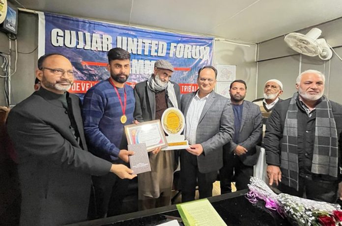 Dignitaries felicitate candidates from Gujjar community who excelled in UPSC examinations and those who were selected as Sub-Inspectors.