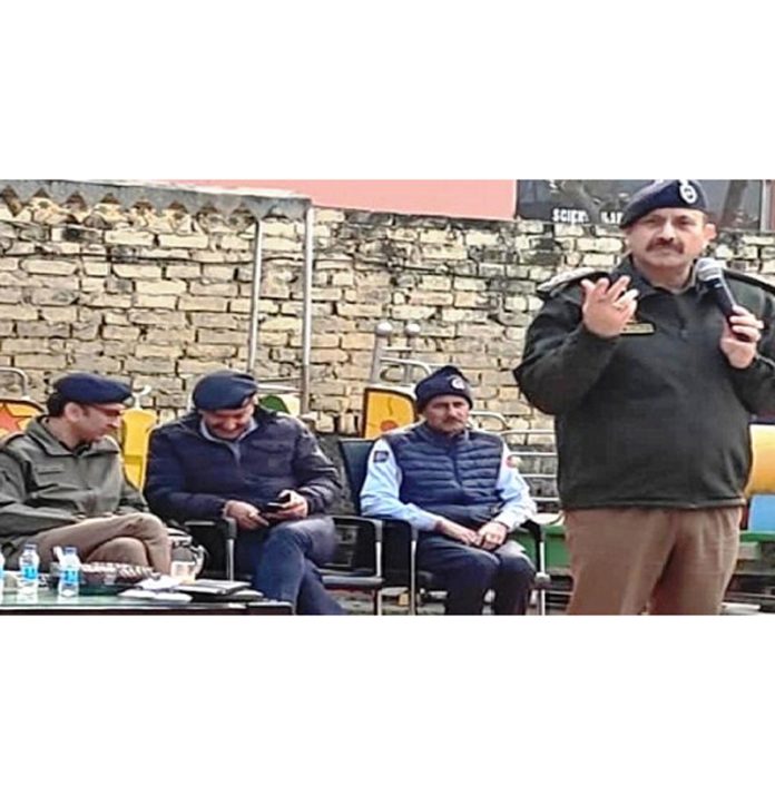 SSP Traffic (Rural) Vinay Kumar addressing at an awareness programme in Vijaypur on Friday.