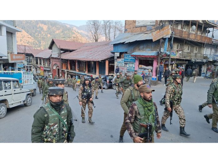 Security forces during a Flag March in Bhadarwah town of Doda district on Thursday. — Excelsior/Tilak Raj Security forces during a Flag March in Bhadarwah town of Doda district on Thursday. — Excelsior/Tilak Raj