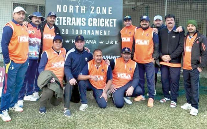Veteran Cricket Association J&K-XI team posing during North Zone tourney at Faridabad. Veteran Cricket Association J&K-XI team posing during North Zone tourney at Faridabad.