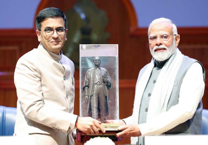 PM Narendra Modi and CJI Dy Chandrachud at a function in New Delhi on Sunday. PM Narendra Modi and CJI Dy Chandrachud at a function in New Delhi on Sunday.