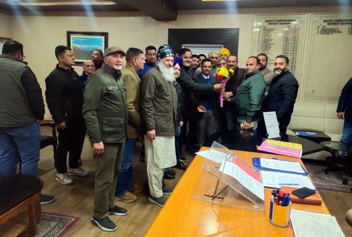 A delegation of Beopar Mandal during meeting with DC Rajouri, OP Bhagat on Tuesday. -Excelsior/Imran