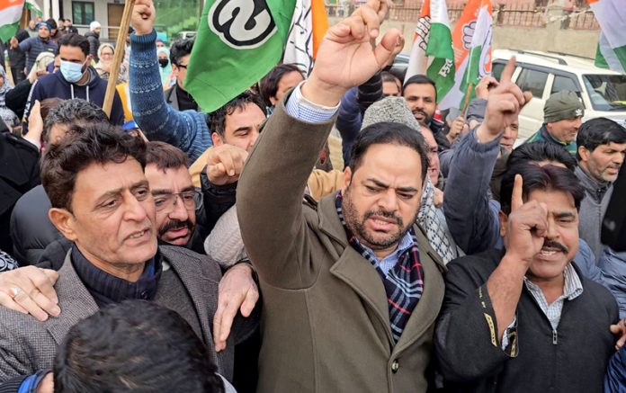 Congress leaders and workers during a protest in Srinagar on Monday. — Excelsior/Shakeel