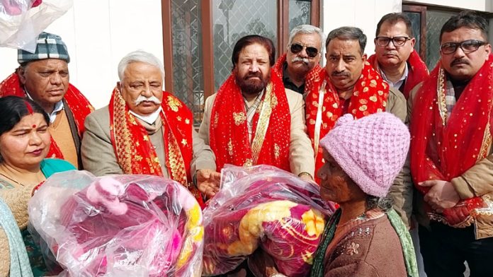 Former Minister and JKNC additional general secretary Ajay Sadhotra distributes blankets among inmates of Rehan Basera Shelter, Bahu Fort on Sunday. Former Minister and JKNC additional general secretary Ajay Sadhotra distributes blankets among inmates of Rehan Basera Shelter, Bahu Fort on Sunday.