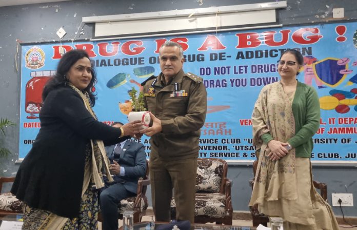 DIG Shakti Pathak being presented a memento during function at JU on Thursday.