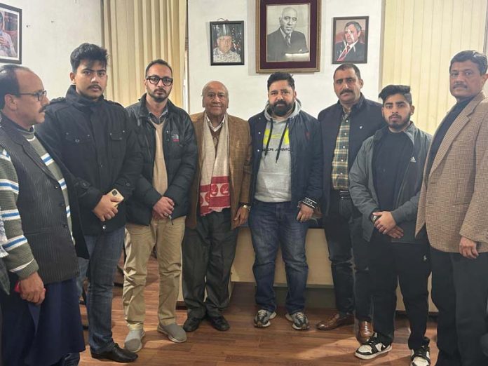 Rattan Lal Gupta, Ajaz Jan and other leaders of NC posing for a group photograph during a party meeting in Jammu on Wednesday.