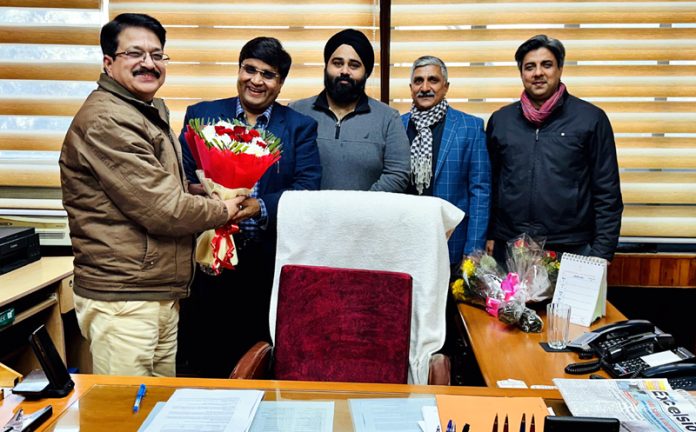 PHDCCI delegation presenting a flower bouquet to Commissioner State Taxes in Jammu on Tuesday. PHDCCI delegation presenting a flower bouquet to Commissioner State Taxes in Jammu on Tuesday.