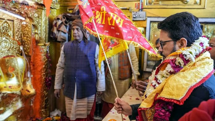 Union Minister Anurag Thakur offers prayers at Hanuman Mandir in Connaught Place, in New Delhi.