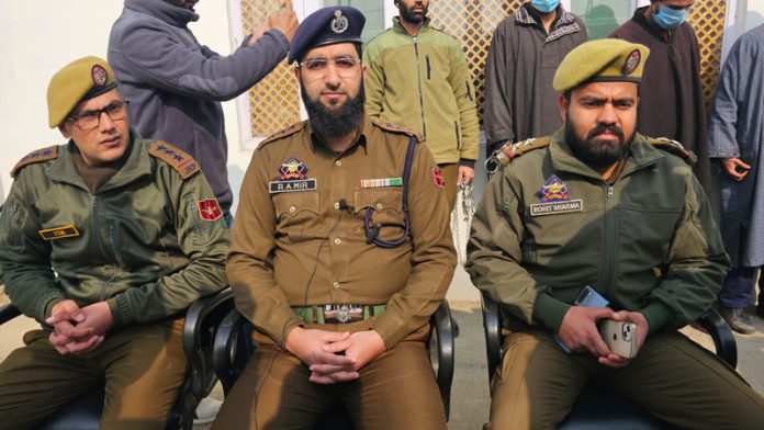 Police team of PS Tarzoo addressing a press conference on Monday. Police team of PS Tarzoo addressing a press conference on Monday.