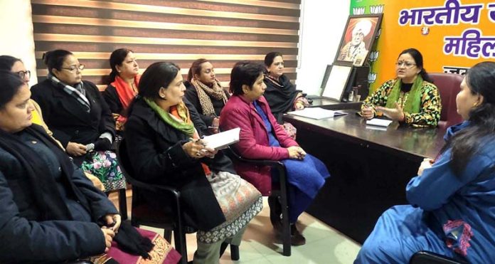 BJP Mahila Morcha president, Sanjita Dogra addressing a party meeting at Jammu on Wednesday.