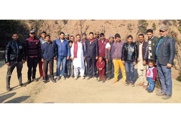 Members of tribal Gaddi community people posing for a group photograph after a meeting at a remote village in Ramban on Sunday. Members of tribal Gaddi community people posing for a group photograph after a meeting at a remote village in Ramban on Sunday.