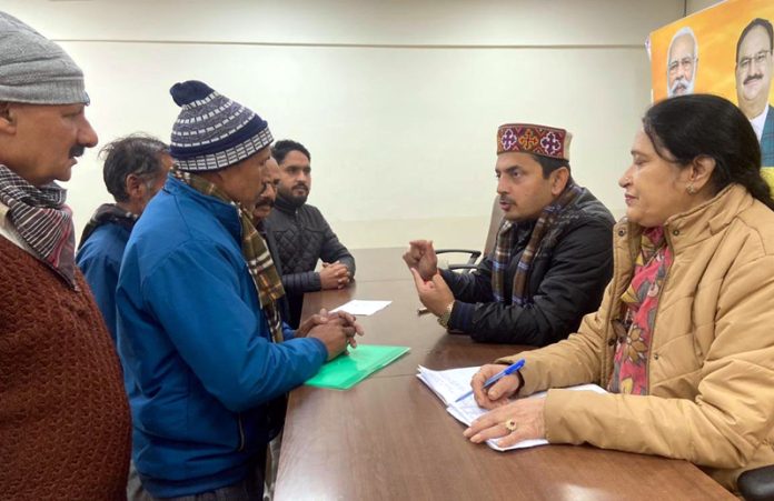 BJP spokesperson and former MLA, R S Pathania listening public grievances at party office Jammu on Tuesday. BJP spokesperson and former MLA, R S Pathania listening public grievances at party office Jammu on Tuesday.