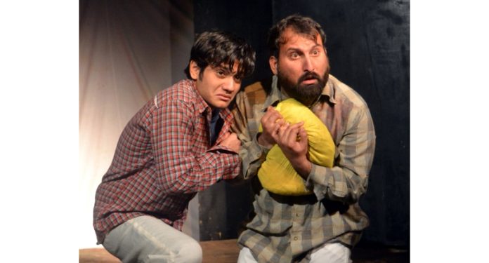 A scene from the play ‘Kharaashein’ staged by Natrang at Jammu on Sunday.
