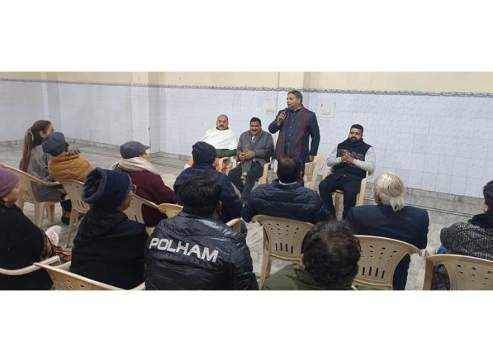 BJP former president, Sat Sharma addressing a meeting at Bakshi Nagar on Monday. BJP former president, Sat Sharma addressing a meeting at Bakshi Nagar on Monday.