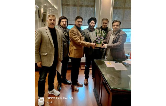 Fouri Quorum members presenting a memento to Secretary, School Education Department, Dr Piyush Singla.