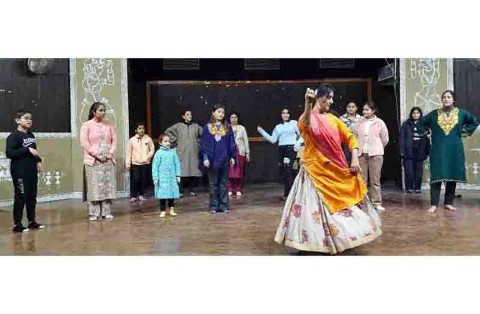 Students learning skills of dance during workshop at JU.