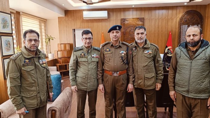 ADGP Armed Jammu and Kashmir, SJM Gillani pinning rank to a newly promoted officer at Armed Police Headquarters in Jammu on Monday.