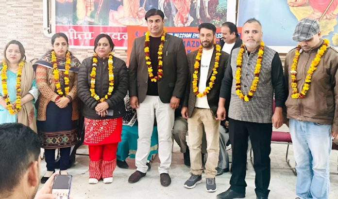 Members of the newly elected Jammu divisional level body of NHM employees posing for a group photograph.