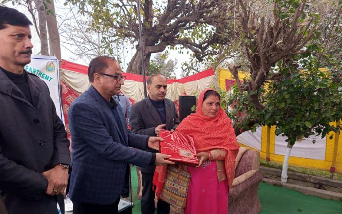 Ajaz Ahamd Bhat, Director Sericulture felicitating farmers and silk rearers during a function in Kathua District on Tuesday.