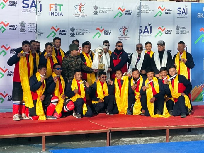 Army team that won Khelo India Winter Games posing with trophy at Leh.