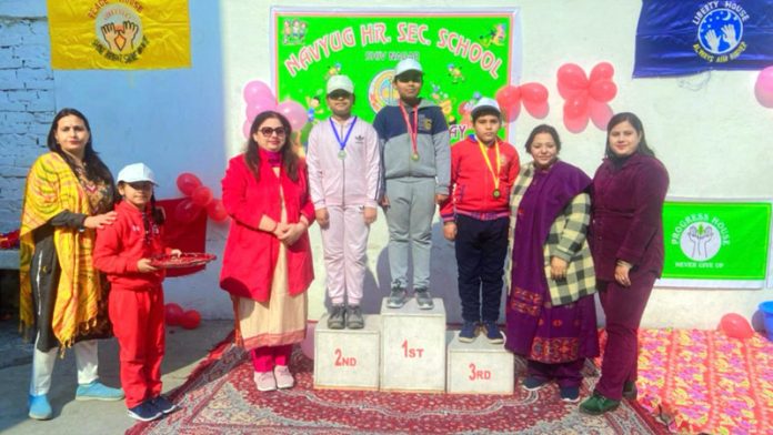 Students on podium posing along with teachers during Annual Sports Day of the school on Friday. Students on podium posing along with teachers during Annual Sports Day of the school on Friday.