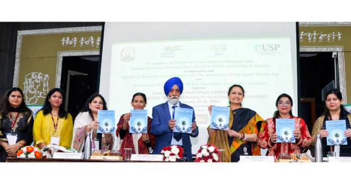 Prof Neelu Rohmetra and others releasing souvenir during inaugural of international conference at ICccR & HRM of JU.