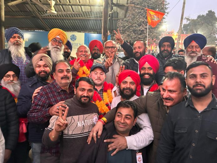 Newly elected team of Railway Station Taxi Operators Union celebrating their victory in Jammu on Friday.