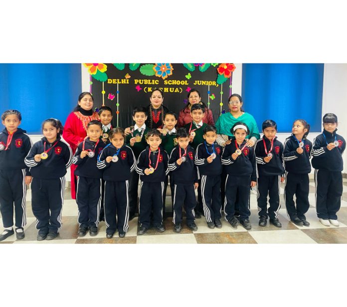 Children of DPS Junior Kathua posing with medals along with teaching faculty on Tuesday. Children of DPS Junior Kathua posing with medals along with teaching faculty on Tuesday.