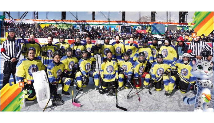 Ice Hockey players posing for group photograph at Leh.