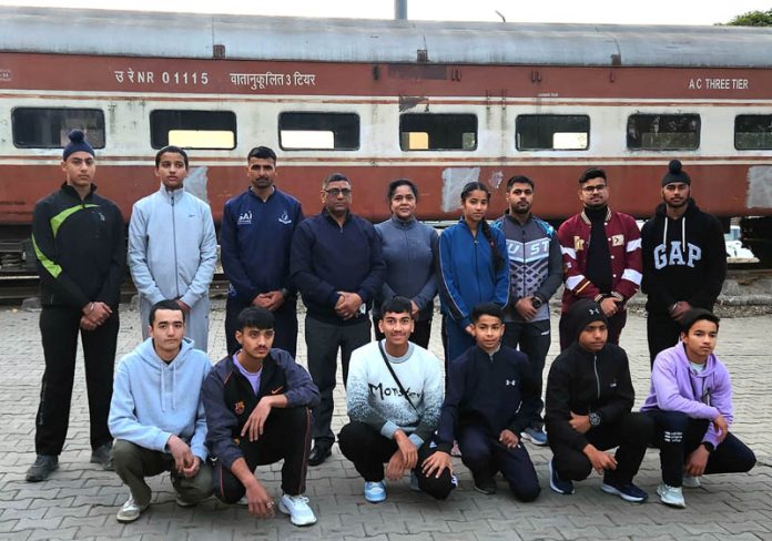 Jammu District Athletics team posing for group photograph at Jammu on Tuesday. Jammu District Athletics team posing for group photograph at Jammu on Tuesday.
