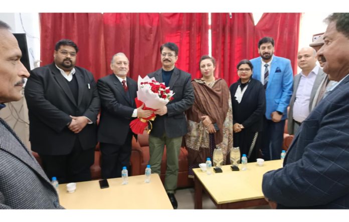 Members of Tax Bar Association during their meeting with Commissioner Taxes P K Bhat in Jammu on Friday.