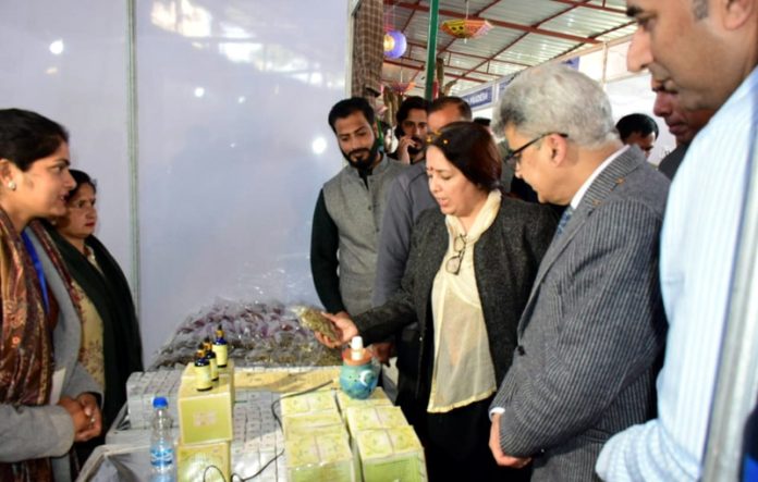 Chief Secretary Atal Dulloo along with Director J&K Rural Livelihoods Mission Indu Kanwal Chib during visit to SARAS Aajeevika Mela on Sunday.