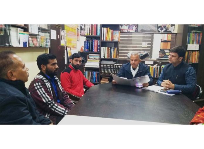 Former MLA and BJP leader Ashwani Sharma listening public grievances in Jammu on Saturday.