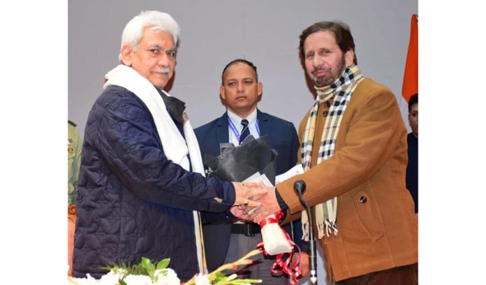 LG felicitating members of OBCs.