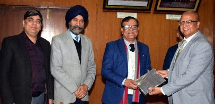 SMVDU Vice-Chancellor and others in workshop.