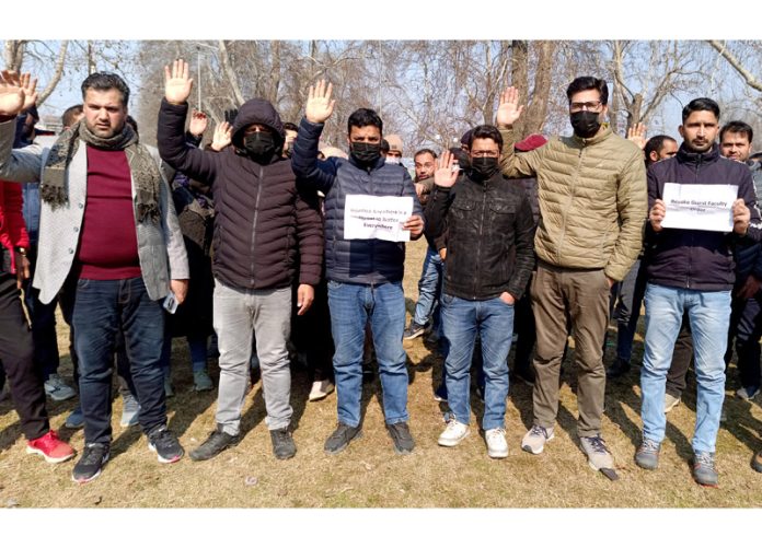 PhD lecturers during a protest at Sher-e-Kashmir Park in Srinagar on Saturday. -Excelsior/Shakeel