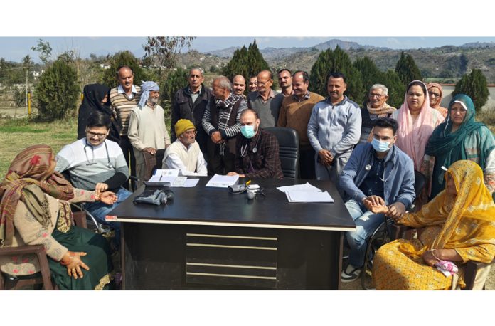 HoD Cardiology GMC Jammu Dr Sushil Sharma examining patients at Nagrota on Sunday.