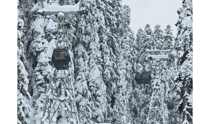 Tourists enjoying Gondola ride in Gulmarg on Friday. — Excelsior/Aabid Nabi