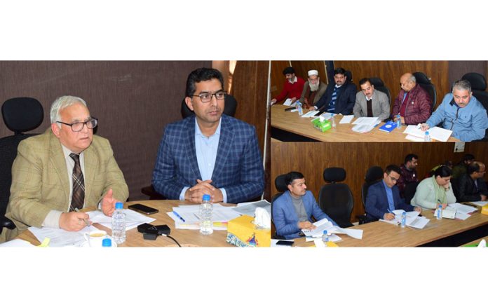 SEC Braj Raj Sharma and Secretary RDD Shahid Choudhary at a review meeting on Friday.