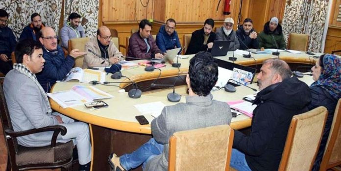Div Com Kashmir Vijay Kumar Bidhuri chairing a meetintg on Thursday.